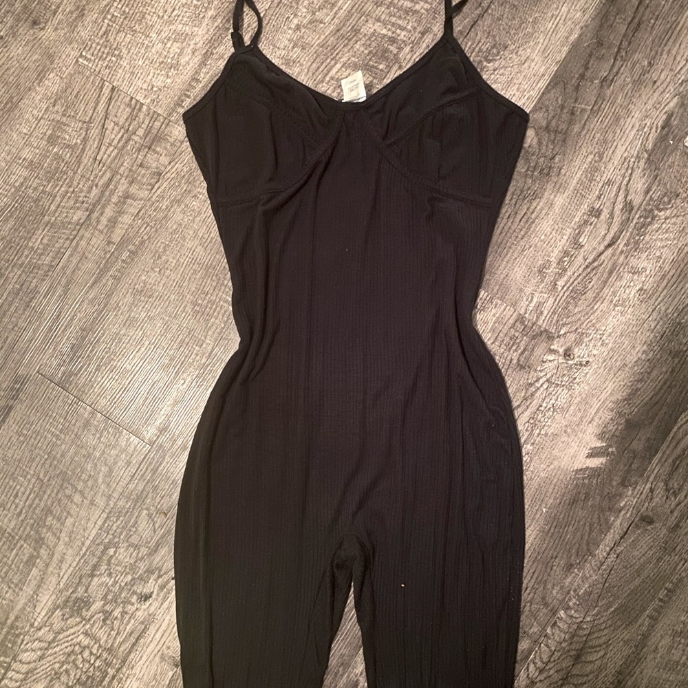Sexy fitted black body suit.